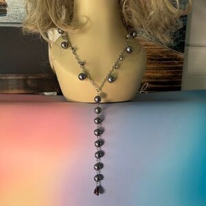 Elegant Silver Necklace Set with Purple Accents.Two pairs of earrings & Bracelet